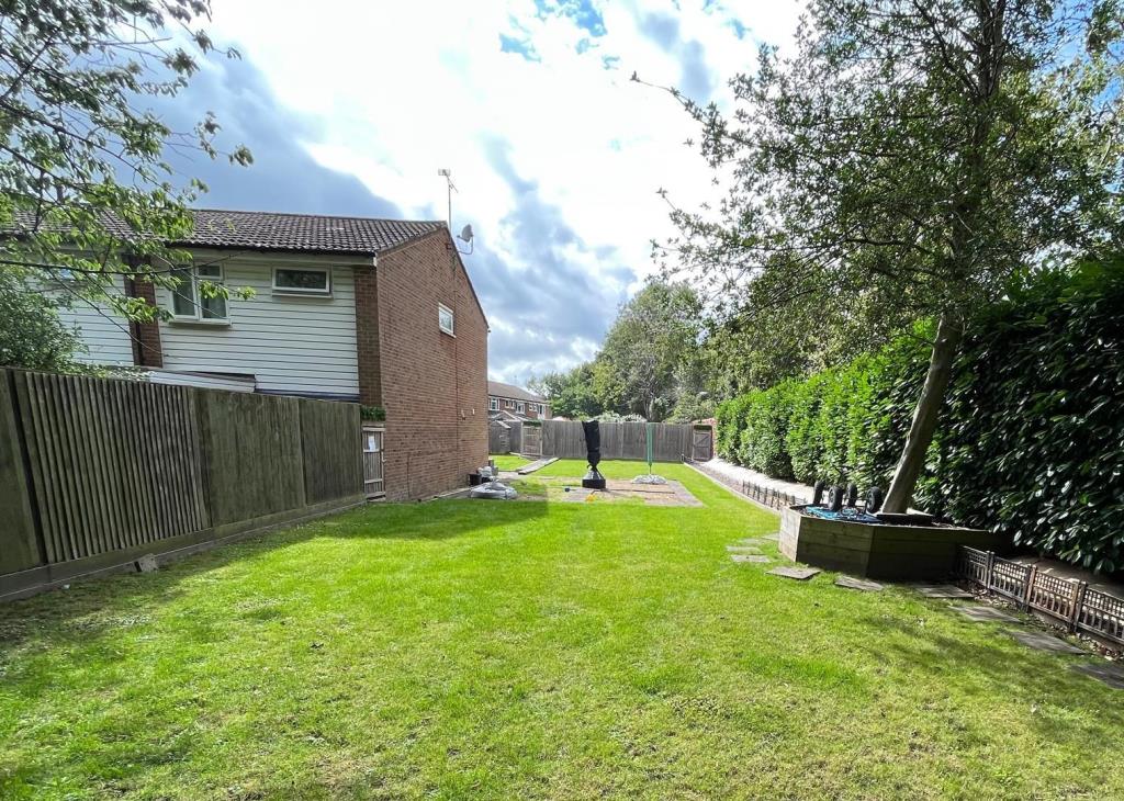 Lot: 127 - LAND WITH PLANNING FOR TWO 2/3 SEMI-DETACHED HOUSES - View of Land from Construction Access - View of Land from Parking Area - Library Photograph